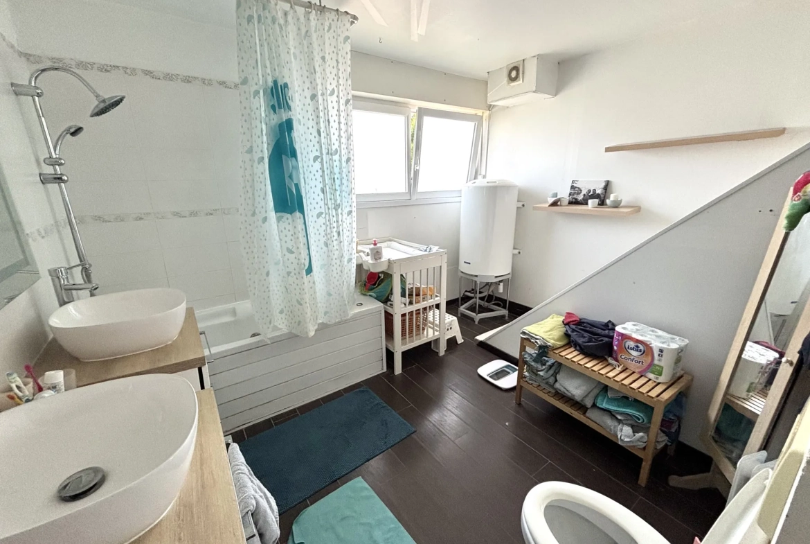 Maison de 112m² à Hem avec jardin et 3 chambres, idéale famille 