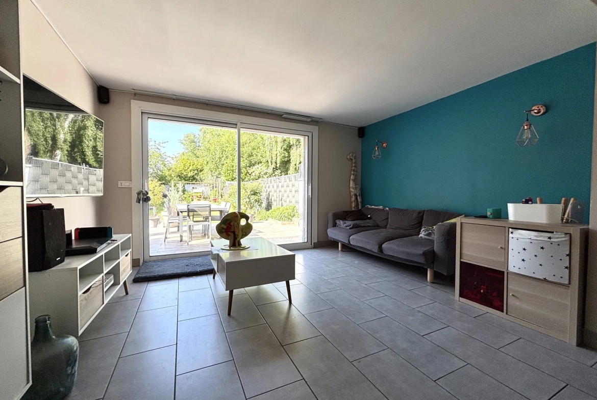 Maison de 112m² à Hem avec jardin et 3 chambres, idéale famille 