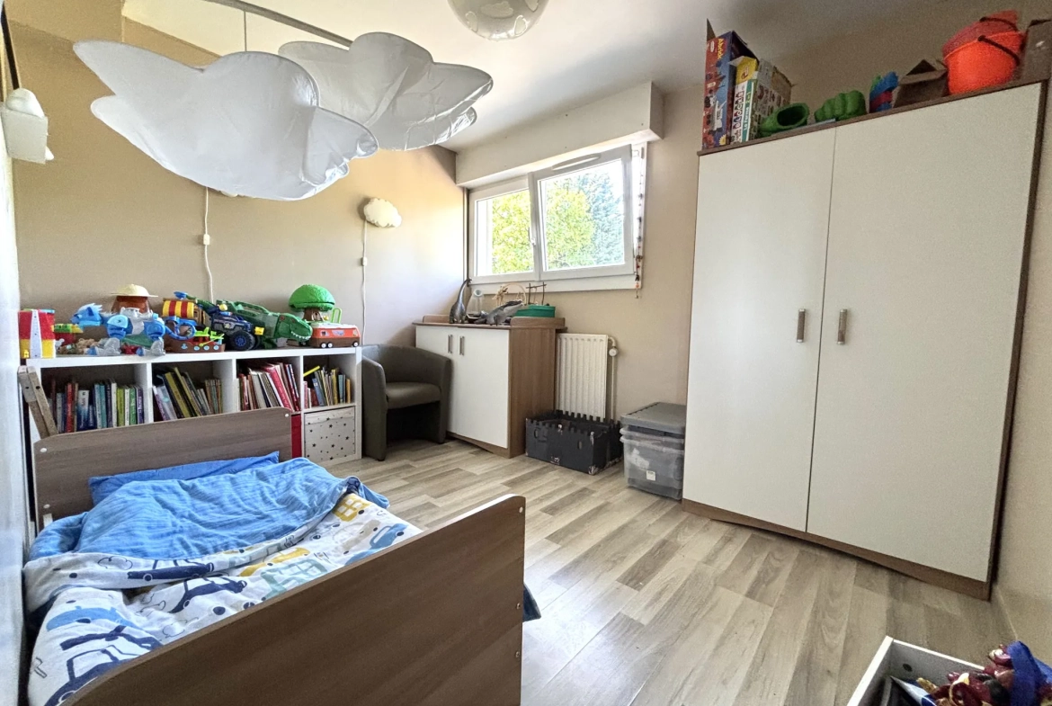 Maison de 112m² à Hem avec jardin et 3 chambres, idéale famille 