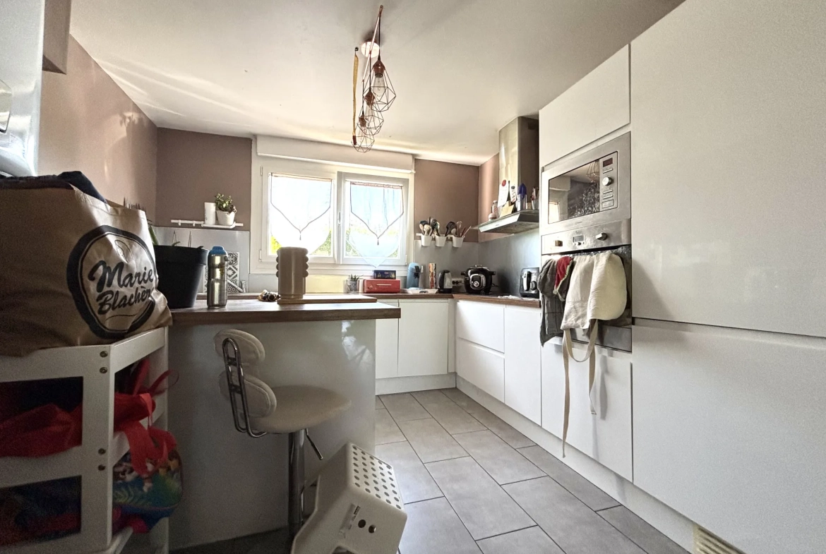 Maison de 112m² à Hem avec jardin et 3 chambres, idéale famille 