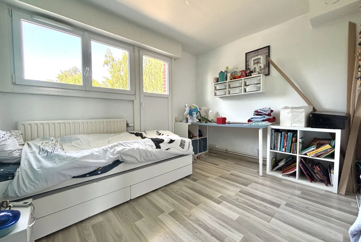 Maison de 112m² à Hem avec jardin et 3 chambres, idéale famille 