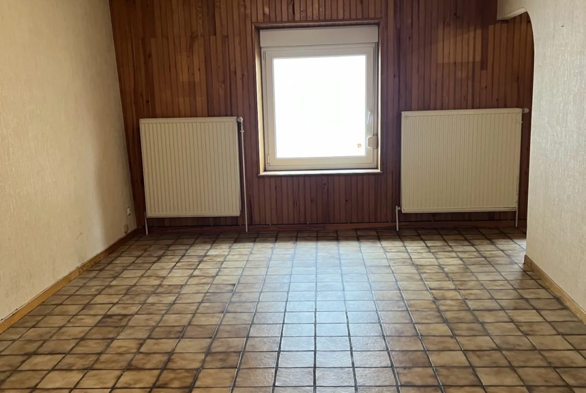 Maison F2 avec jardin et stationnement à Boulay - Opportunité à petit budget 