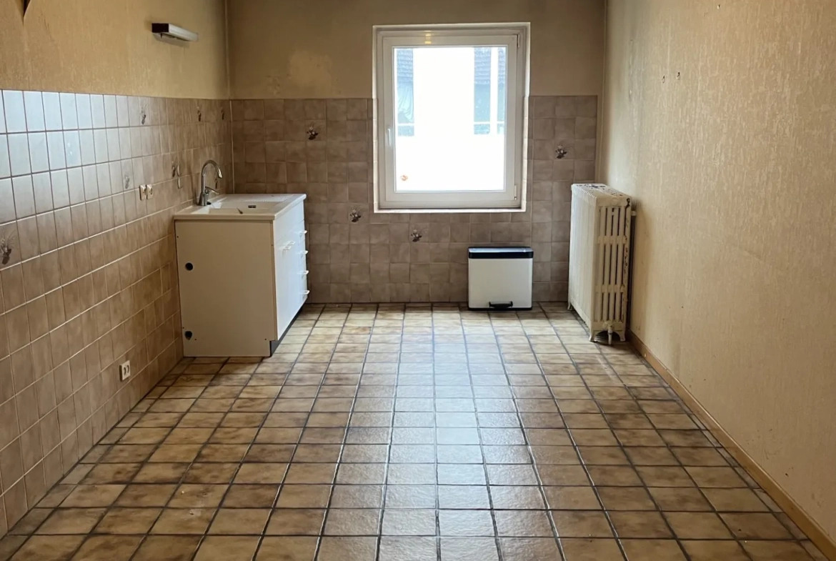 Maison F2 avec jardin et stationnement à Boulay - Opportunité à petit budget 