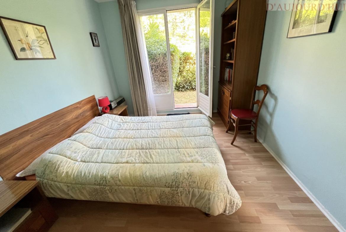 Appartement 3 pièces de 62 m² à Blonville-sur-Mer avec jardin privatif, balcon, cuisine équipée, double séjour et bow-window, dans résidence de standing.