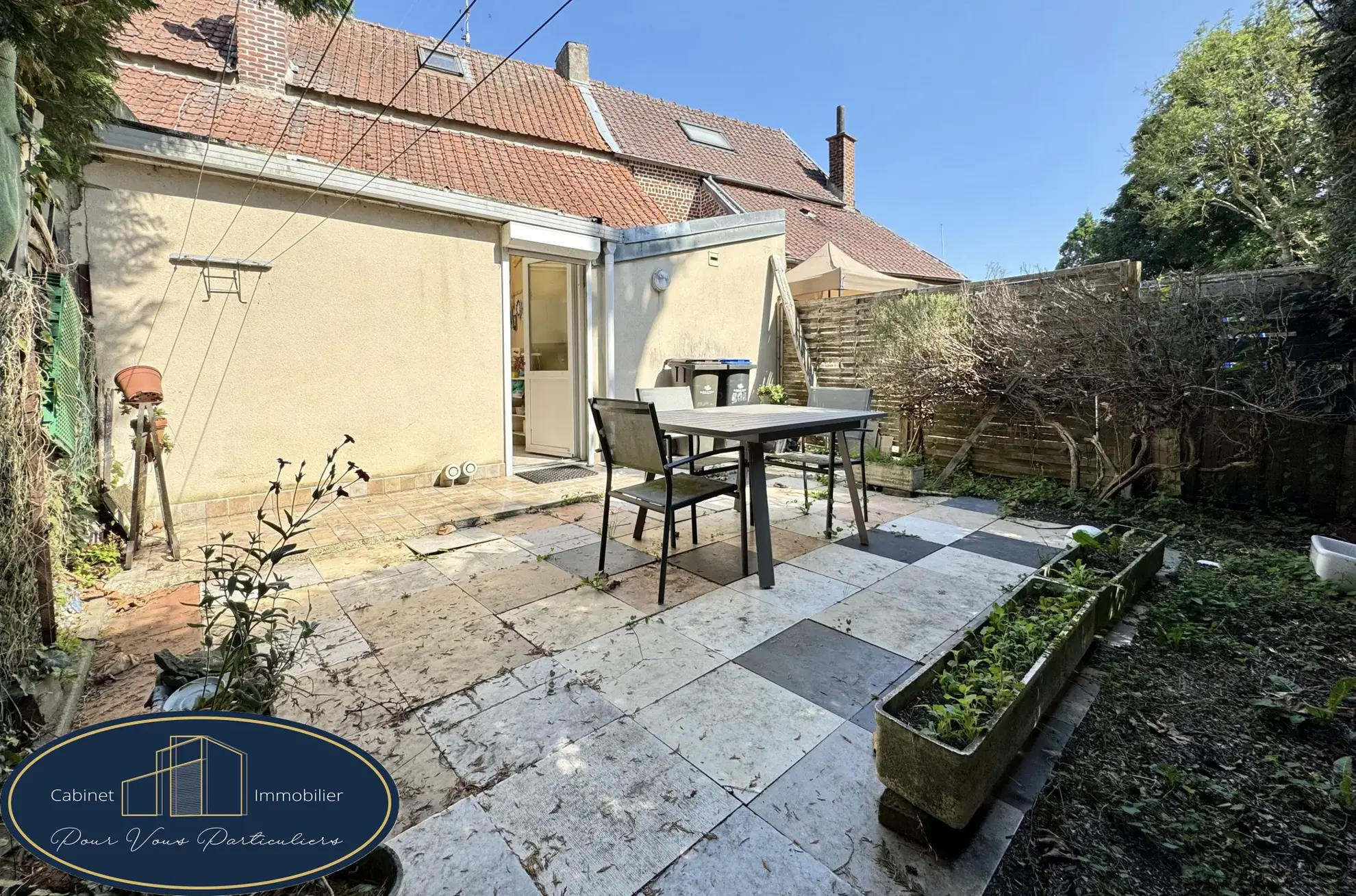 Maison mitoyenne à Haulchin de 73 m² - 2 chambres, cour et cave 