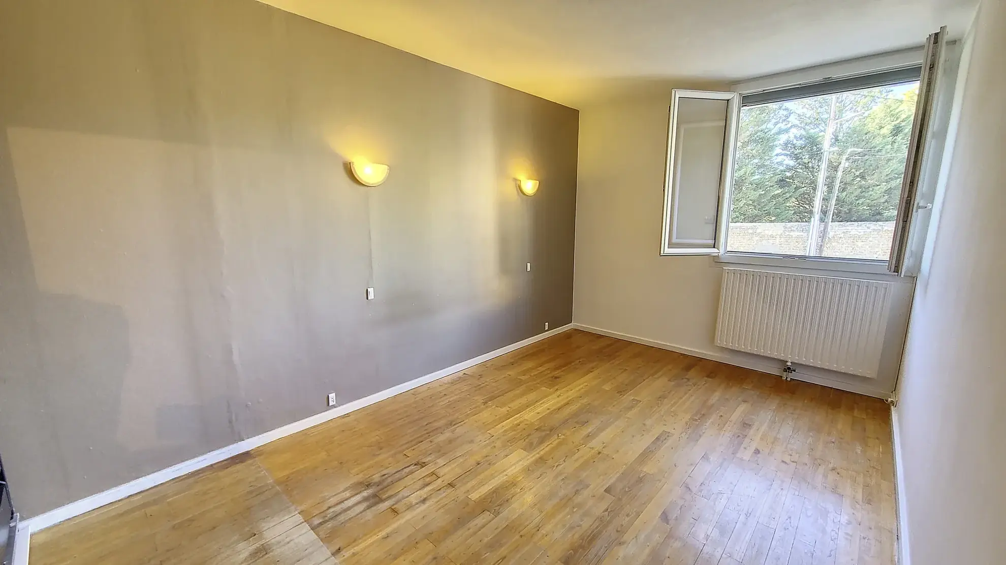 Appartement T4 à Irigny de 77 m² avec parking et cave - Résidence sécurisée 