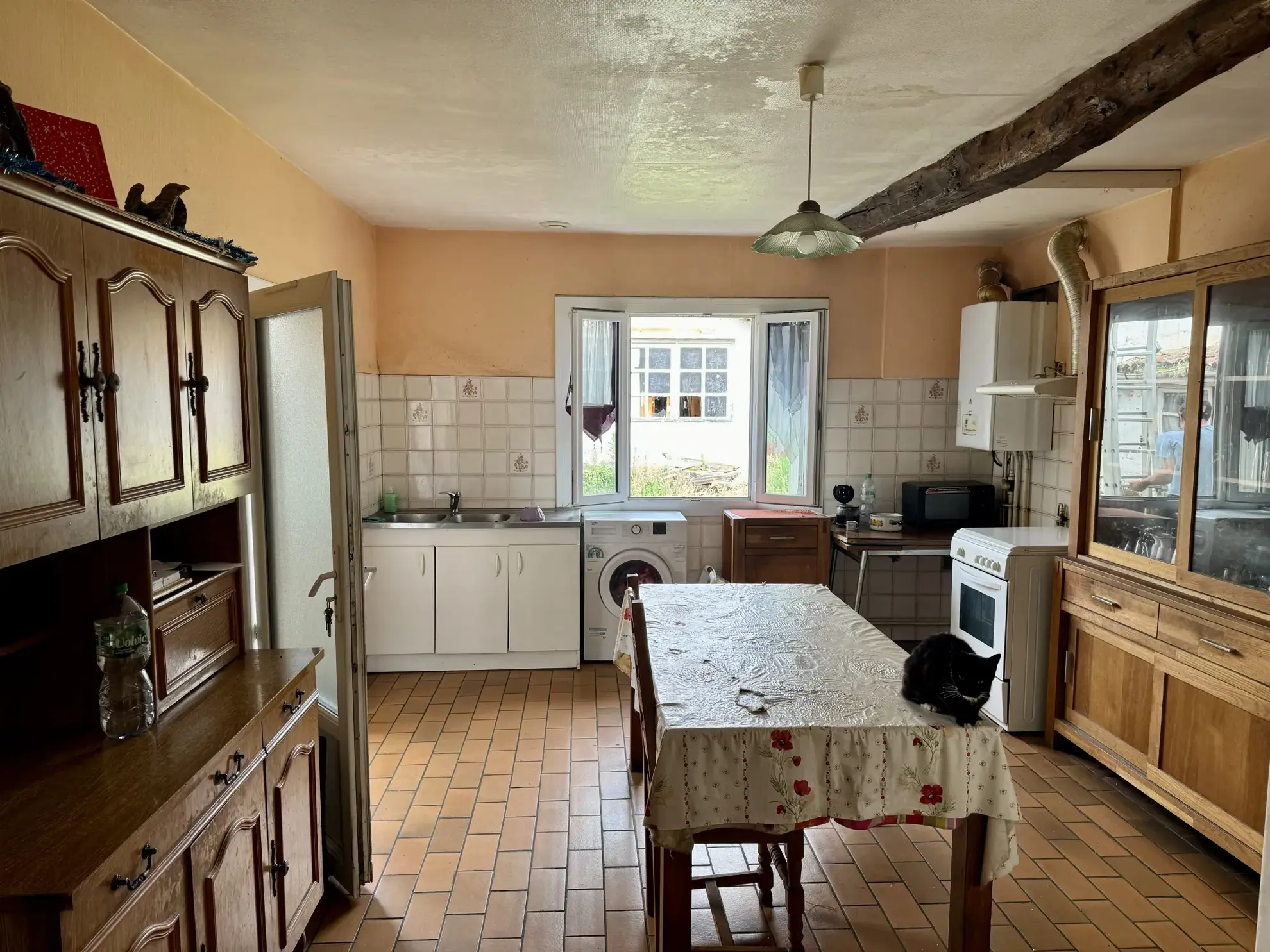 Investissement immobilier à Bergerac avec deux appartements loués, dépendance et grand garage 