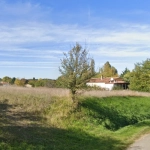 Terrain constructible de 4 557 m² à Mouchan – Cadre paisible dans le Gers