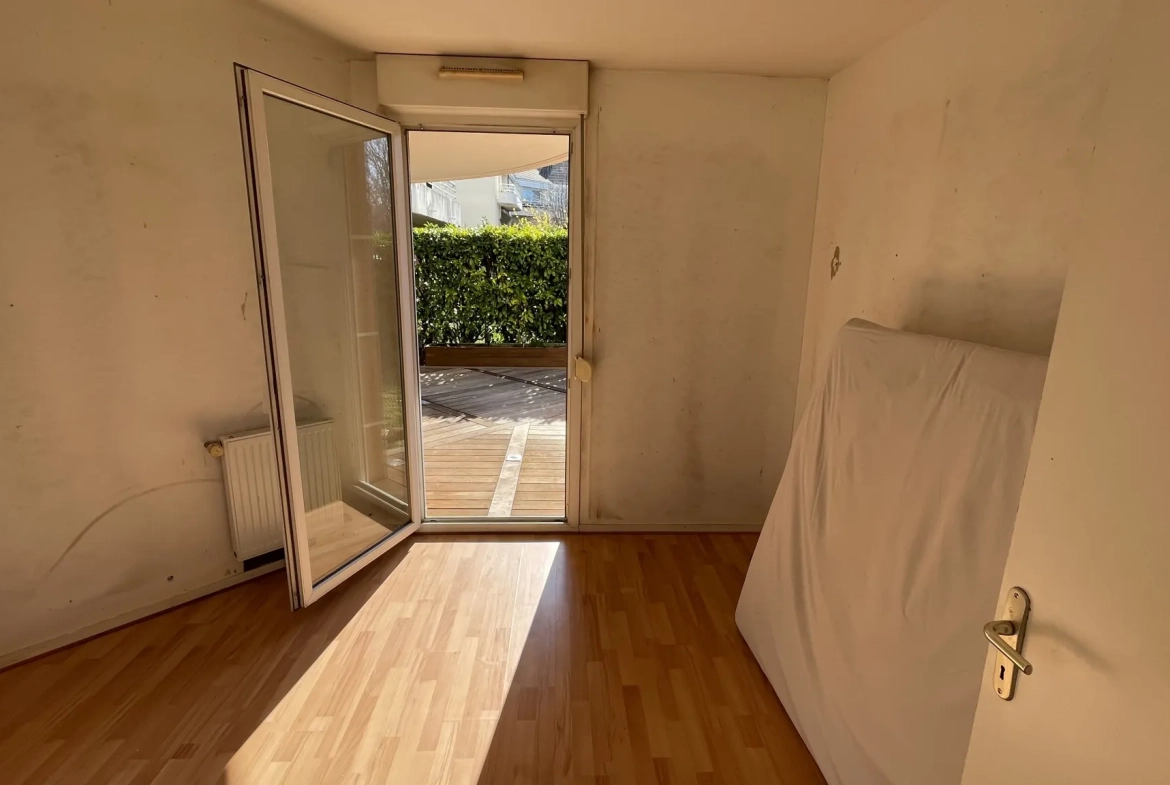Appartement T3 en rez-de-jardin à Dijon Toison d'Or avec jardin, cave et parking 