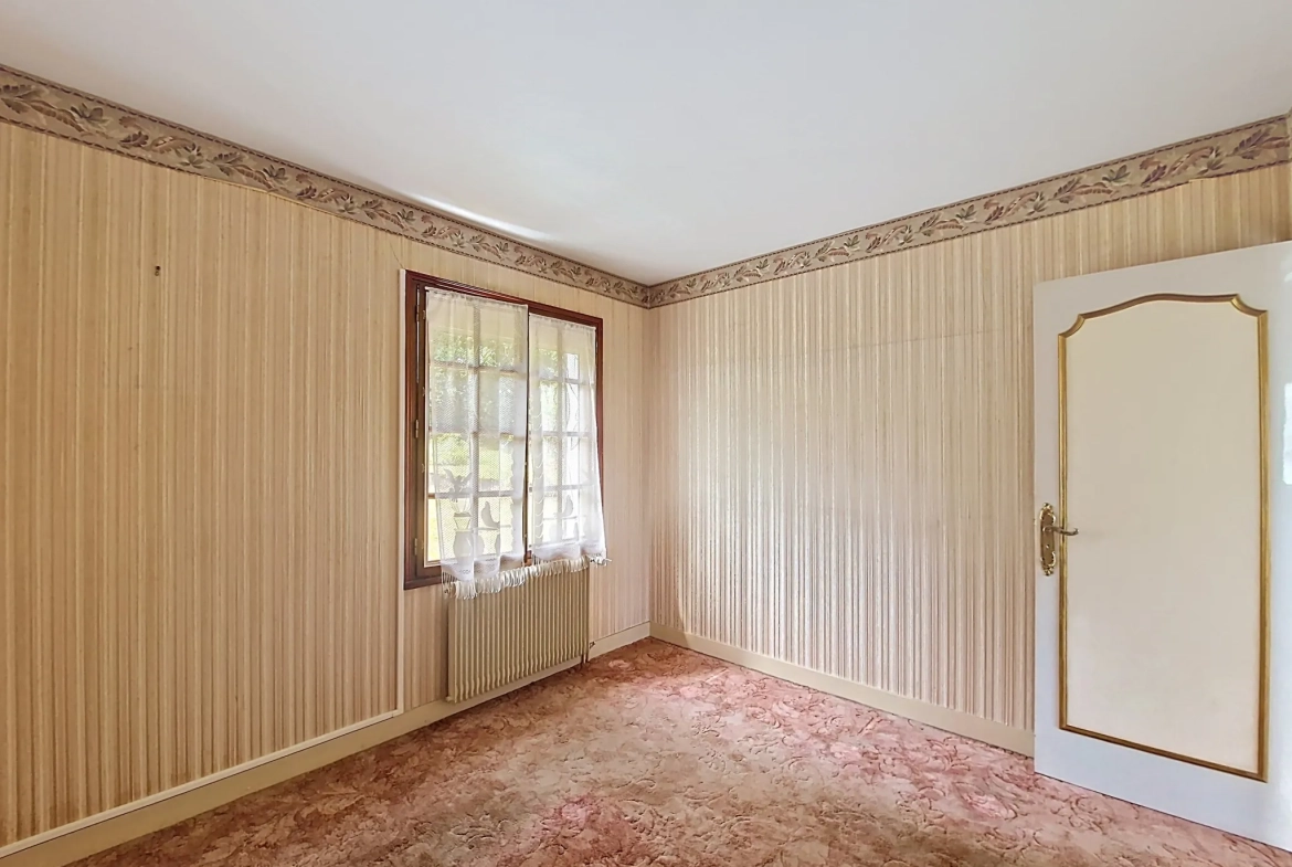 Maison à Bourganeuf avec terrasse, 3 chambres et sous-sol aménagé 
