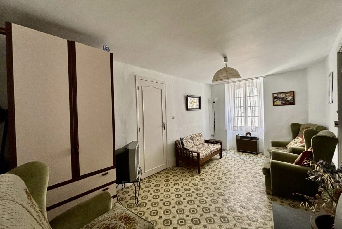 Maison de village avec terrasse, garage et vues imprenables à Alignan-du-Vent 