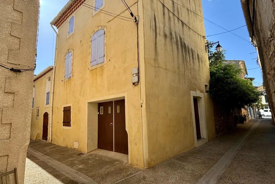 Maison de village avec terrasse, garage et vues imprenables à Alignan-du-Vent 