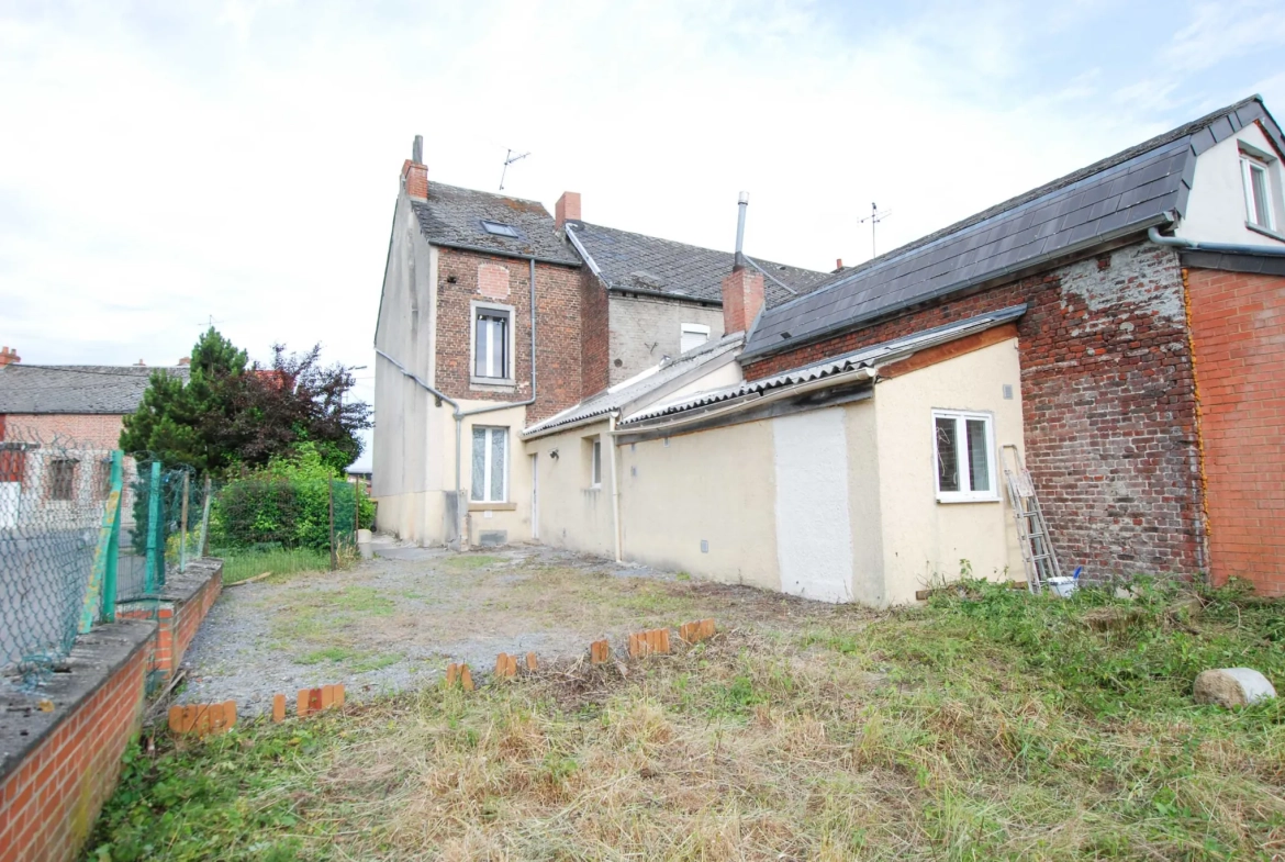Maison 4 chambres à Jeumont avec jardin et grand potentiel 
