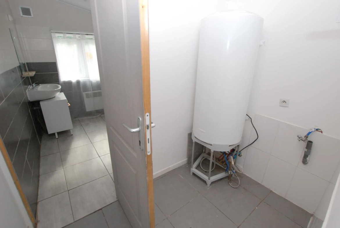 Maison 4 chambres à Jeumont avec jardin et grand potentiel 