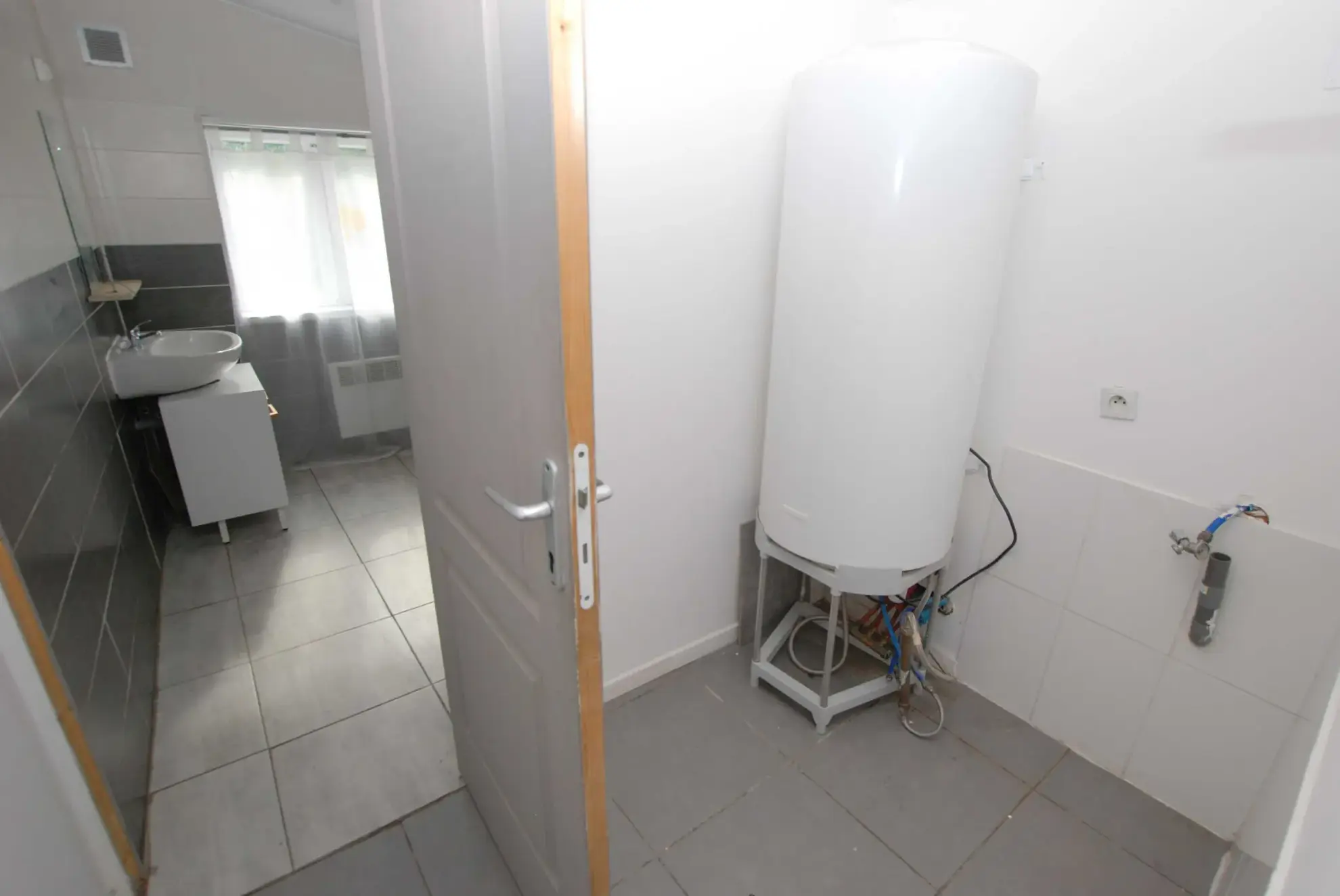 Maison 4 chambres à Jeumont avec jardin et grand potentiel 