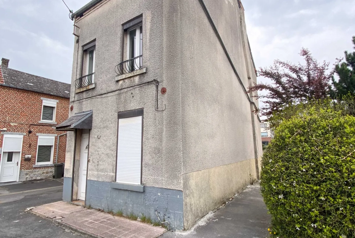 Maison 4 chambres à Jeumont avec jardin et grand potentiel 