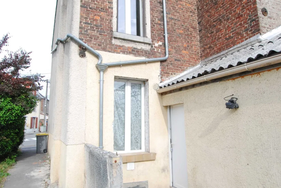 Maison 4 chambres à Jeumont avec jardin et grand potentiel 