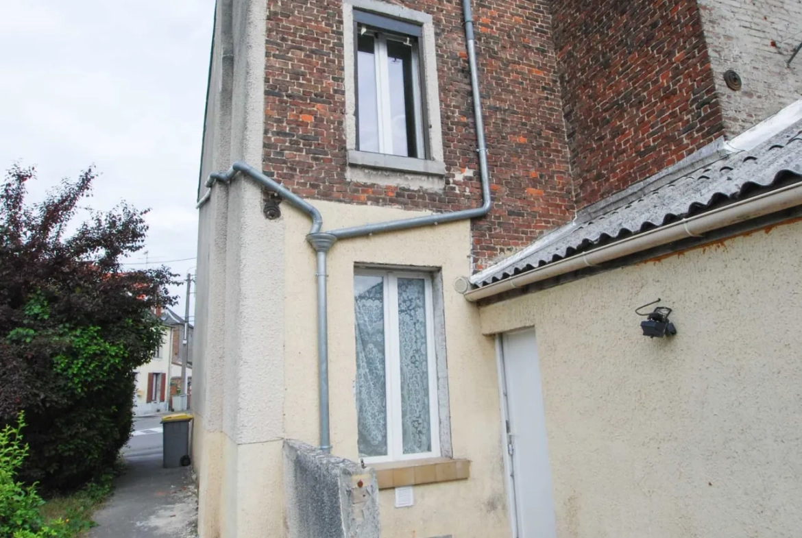 Maison 4 chambres à Jeumont avec jardin et grand potentiel 