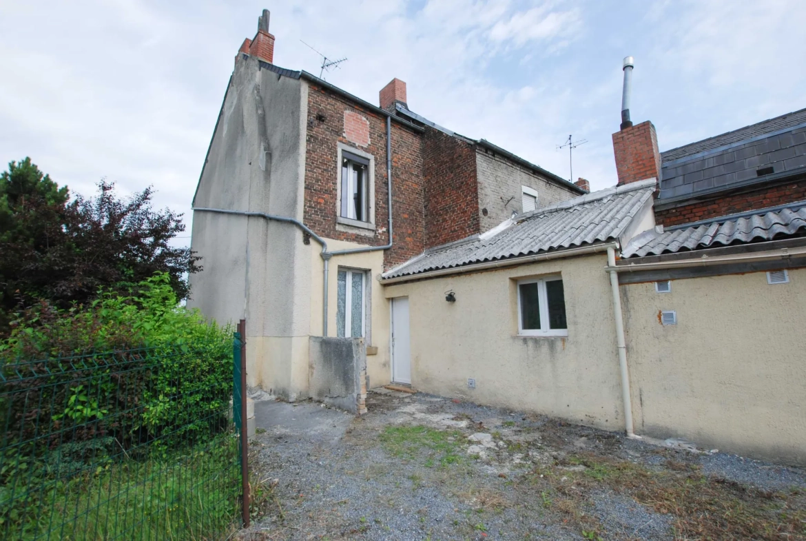 Maison 4 chambres à Jeumont avec jardin et grand potentiel 