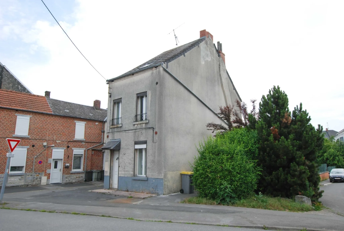 Maison 4 chambres à Jeumont avec jardin et grand potentiel 