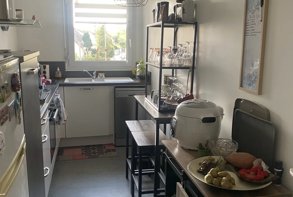 Appartement à vendre à Taverny avec balcon, rénové e et box en sous-sol 