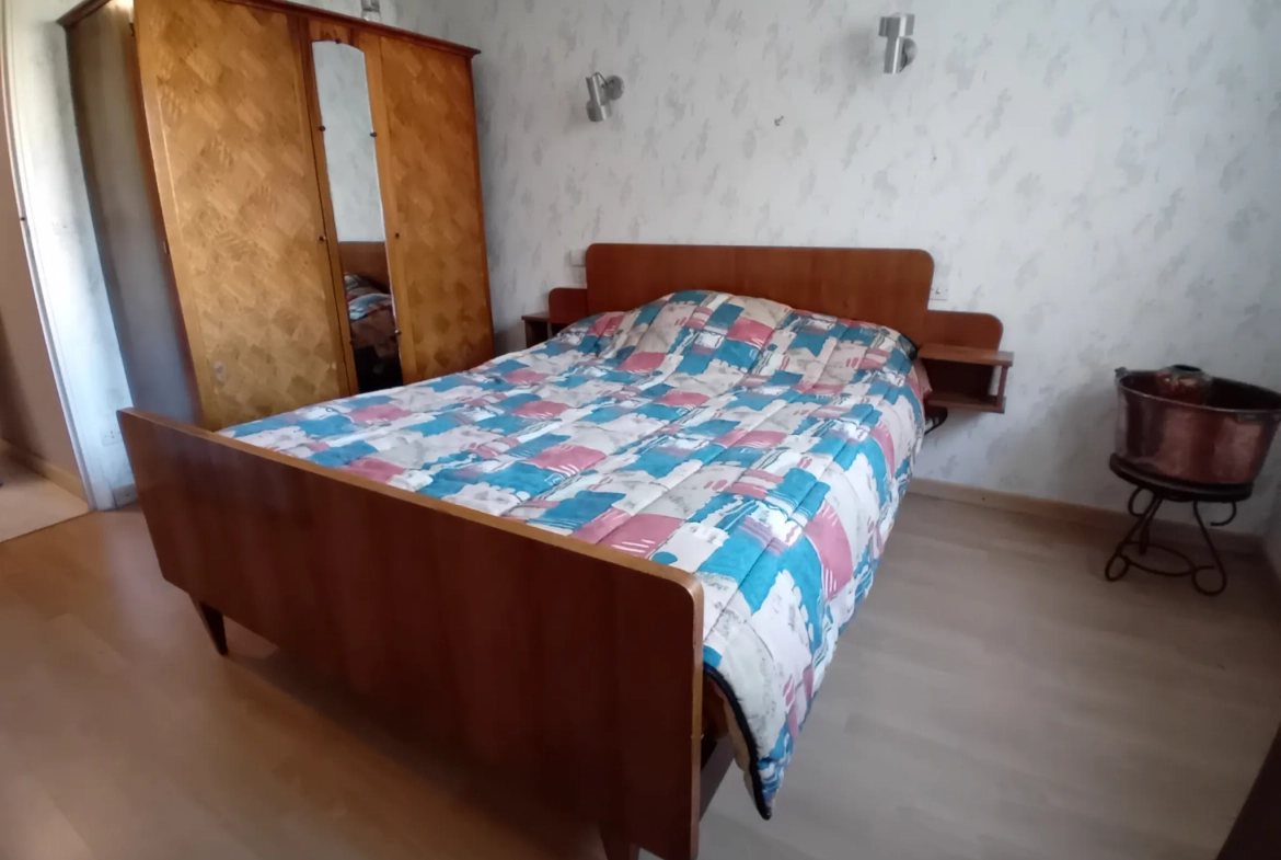 Maison familiale à Millau avec 4 chambres, jardin et garage - Secteur Millau 
