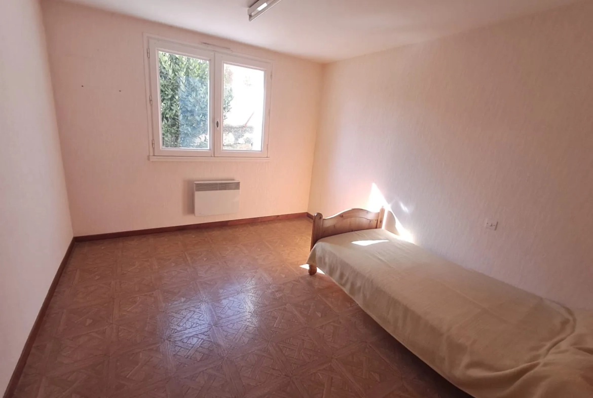 Maison familiale à Millau avec 4 chambres, jardin et garage - Secteur Millau 