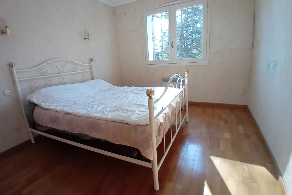 Maison familiale à Millau avec 4 chambres, jardin et garage - Secteur Millau 