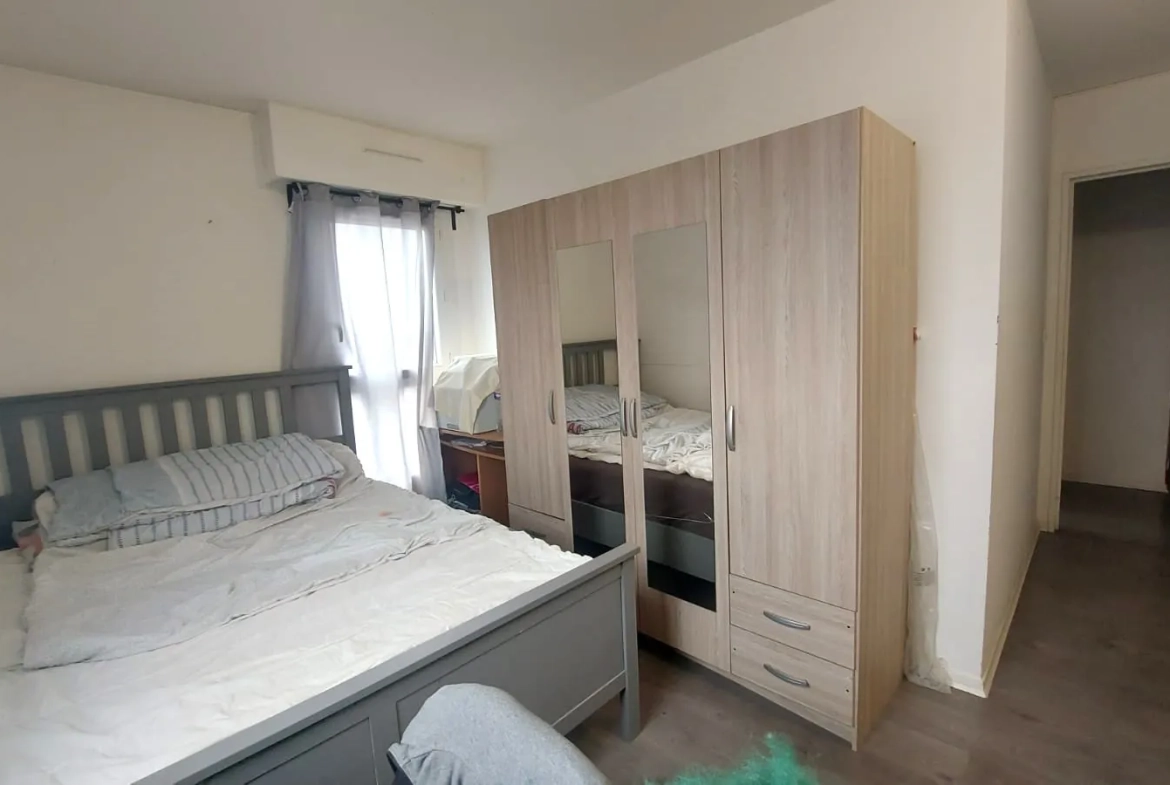 Appartement T4 avec 3 chambres à Montmagny, loué, parking et cave, bon placement immobilier 