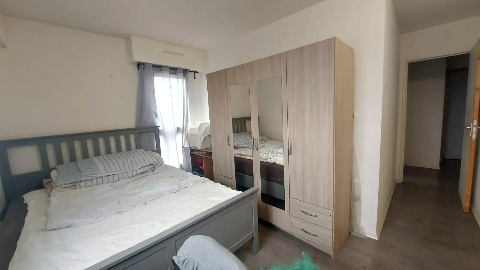Appartement T4 avec 3 chambres à Montmagny, loué, parking et cave, bon placement immobilier 