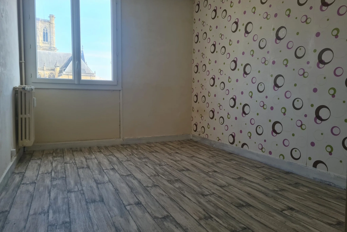 Appartement T. 3 au centre de Nevers avec balcon, cave et parking en vente 