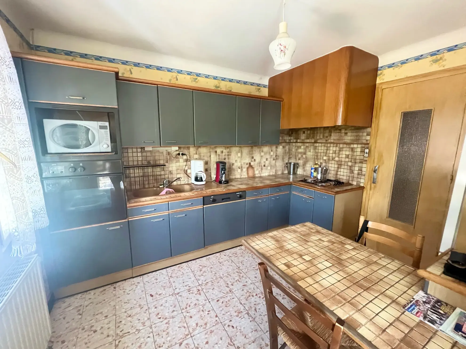 Maison familiale à Communay avec grand terrain et potentiel à moderniser 