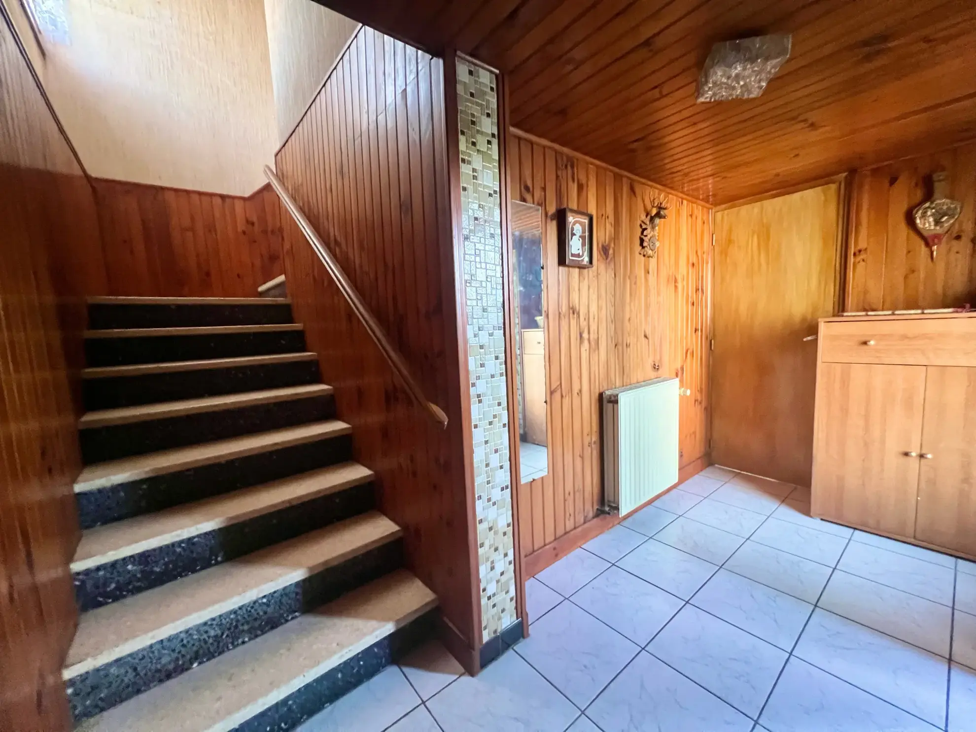 Maison familiale à Communay avec grand terrain et potentiel à moderniser 
