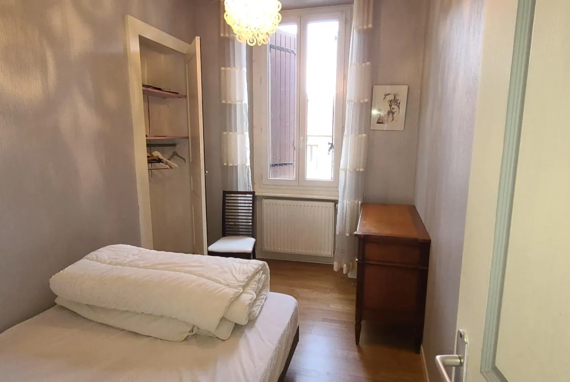 Appartement T3 à Saint-Mamet de 50 m² avec parking et local à skis, vue montagne 