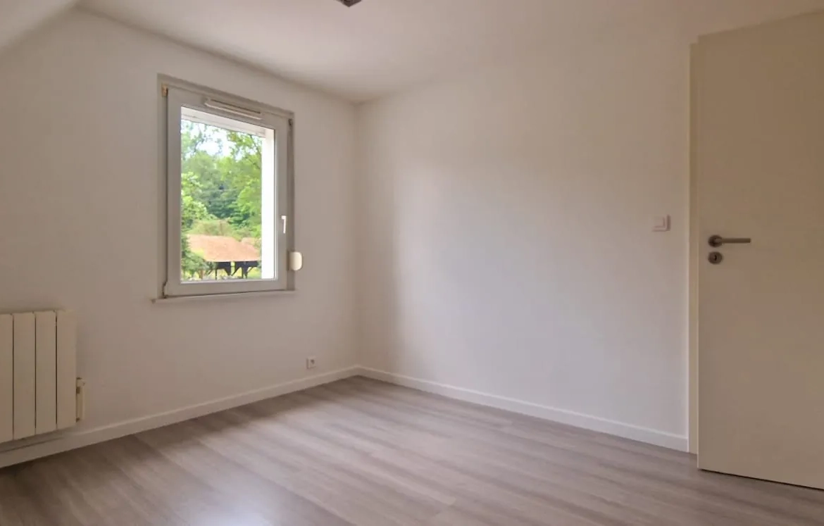 Appartement spacieux avec balcon, parking et cave à Blotzheim 