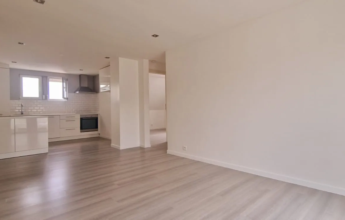 Appartement spacieux avec balcon, parking et cave à Blotzheim 
