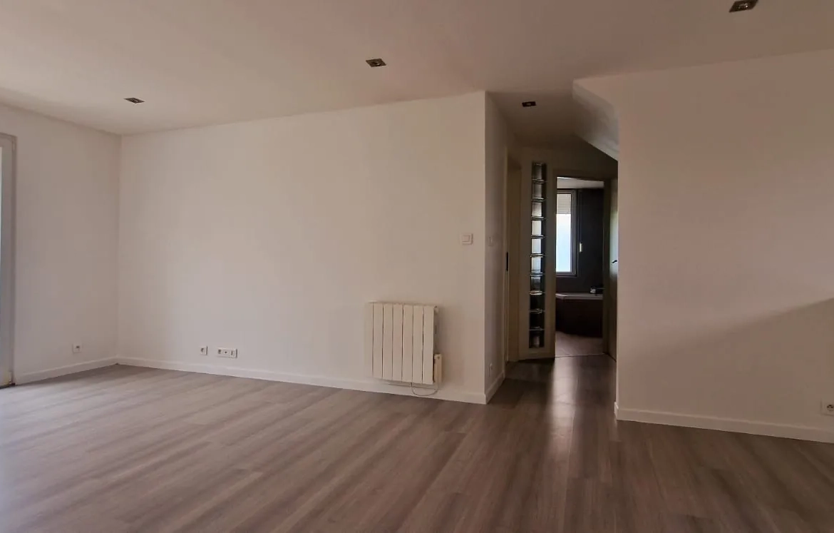 Appartement spacieux avec balcon, parking et cave à Blotzheim 