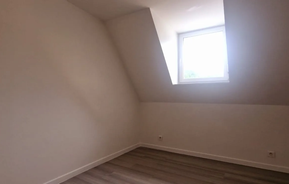 Appartement spacieux avec balcon, parking et cave à Blotzheim 