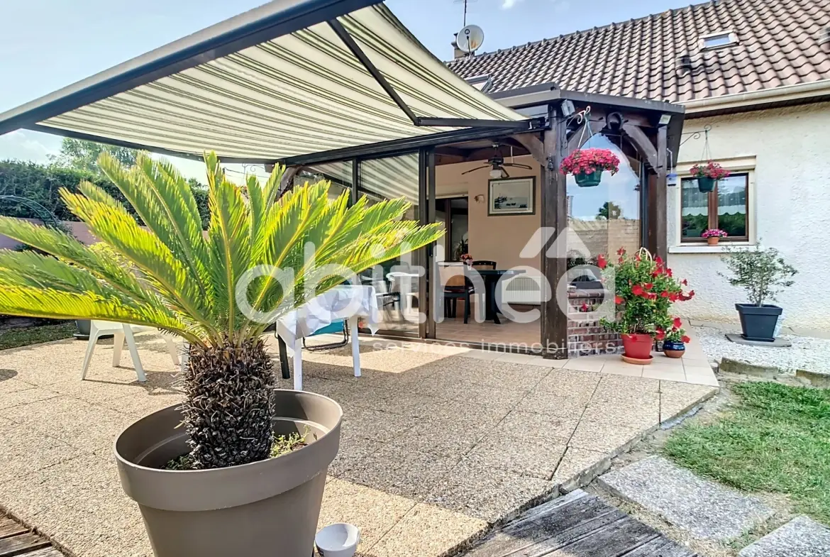 Maison 4 pièces de 135 m² à Feuges, cadre calme avec piscine et jardin 