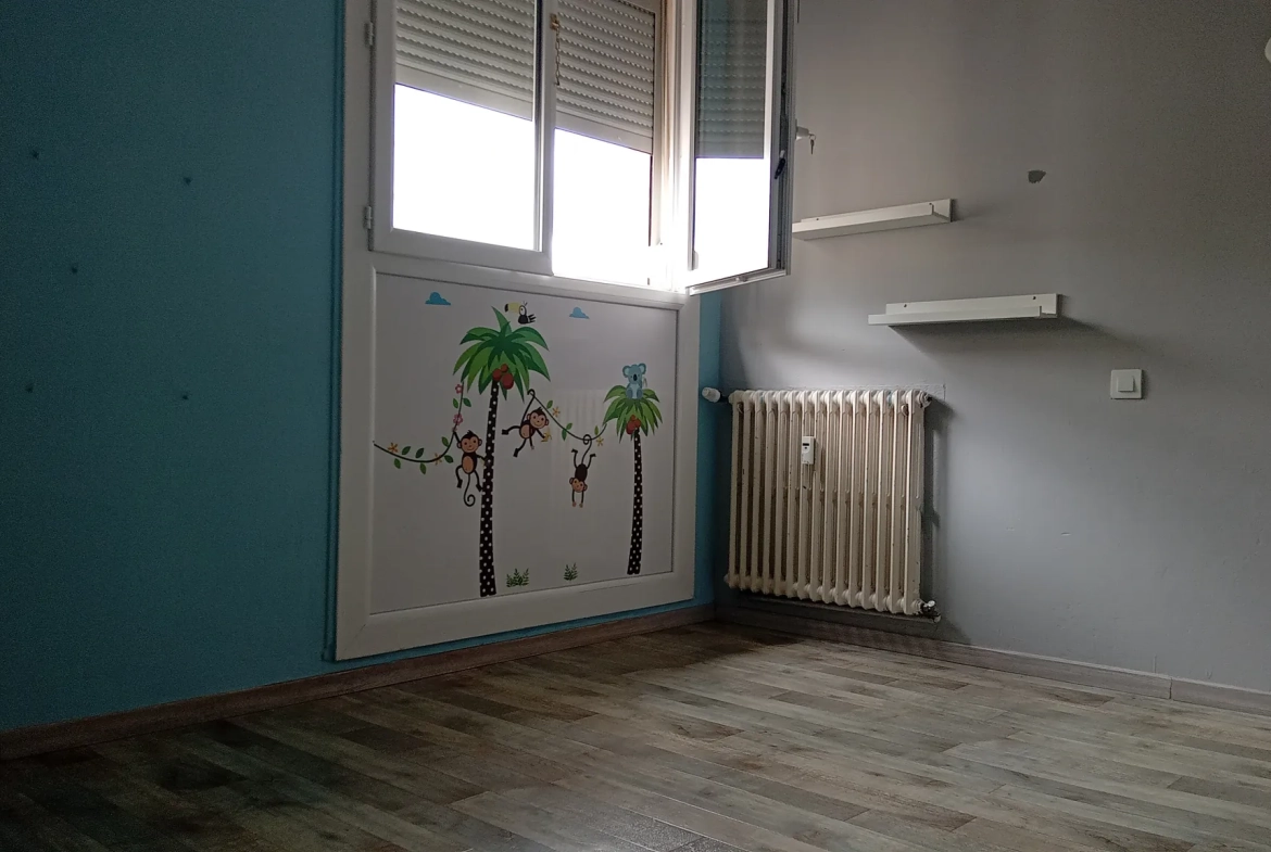 Appartement T3 à Millau avec cave, proche commodités et travaux à prévoir 