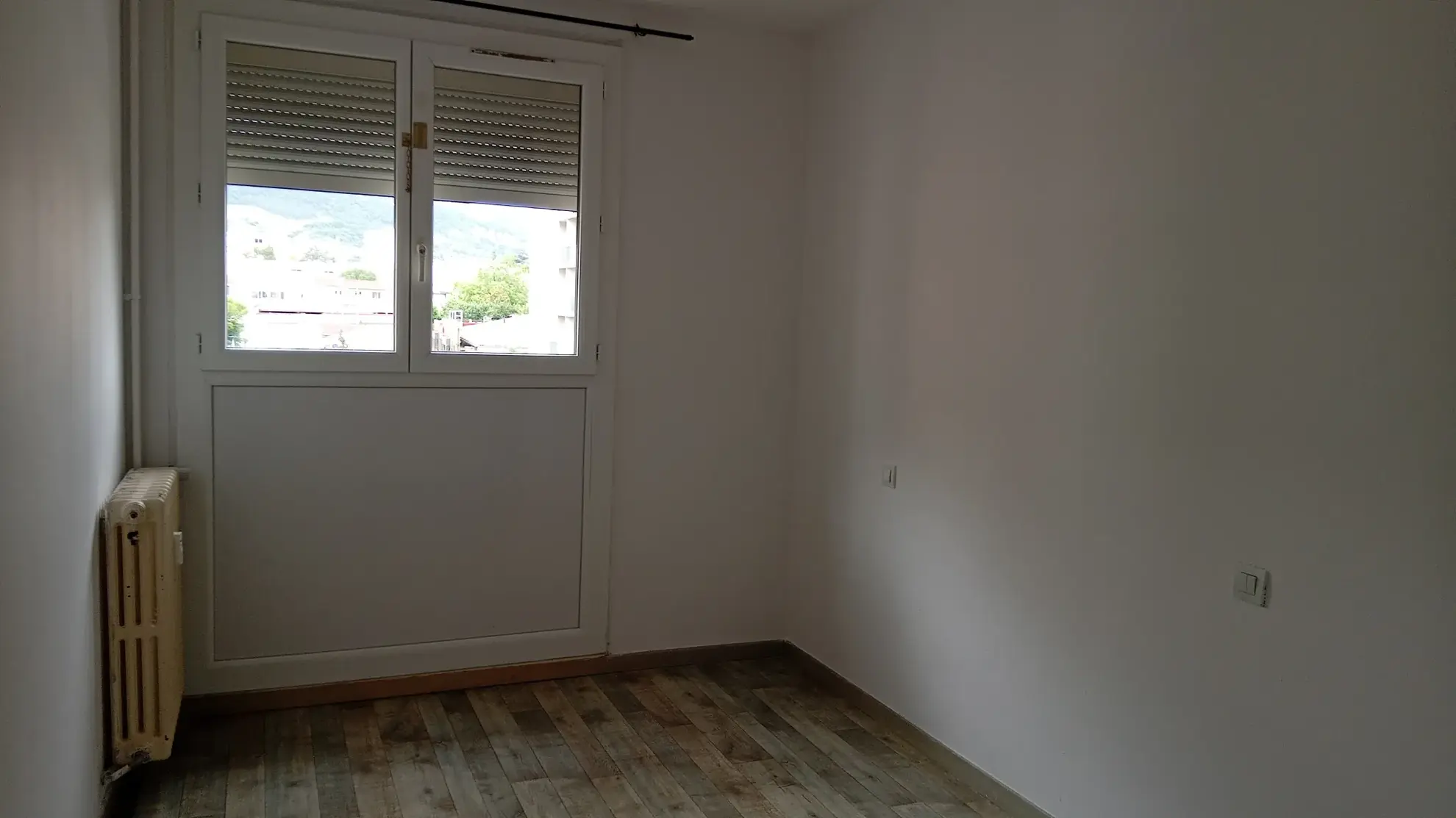 Appartement T3 à Millau avec cave, proche commodités et travaux à prévoir 