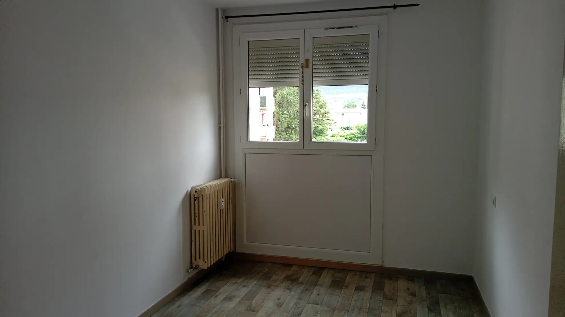 Appartement T3 à Millau avec cave, proche commodités et travaux à prévoir 