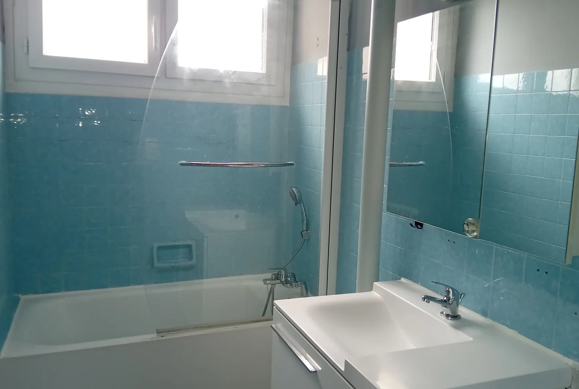 Appartement T3 à Millau avec cave, proche commodités et travaux à prévoir 