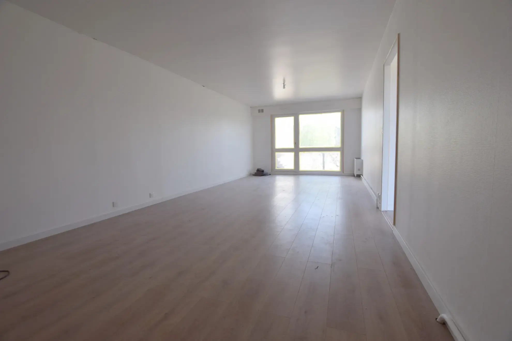 Maison mitoyenne rénovée avec jardin à Héricourt (70) – 3 chambres, garage, à proximité des commerces 