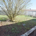 Maison mitoyenne rénovée avec jardin à Héricourt (70) – 3 chambres, garage, à proximité des commerces