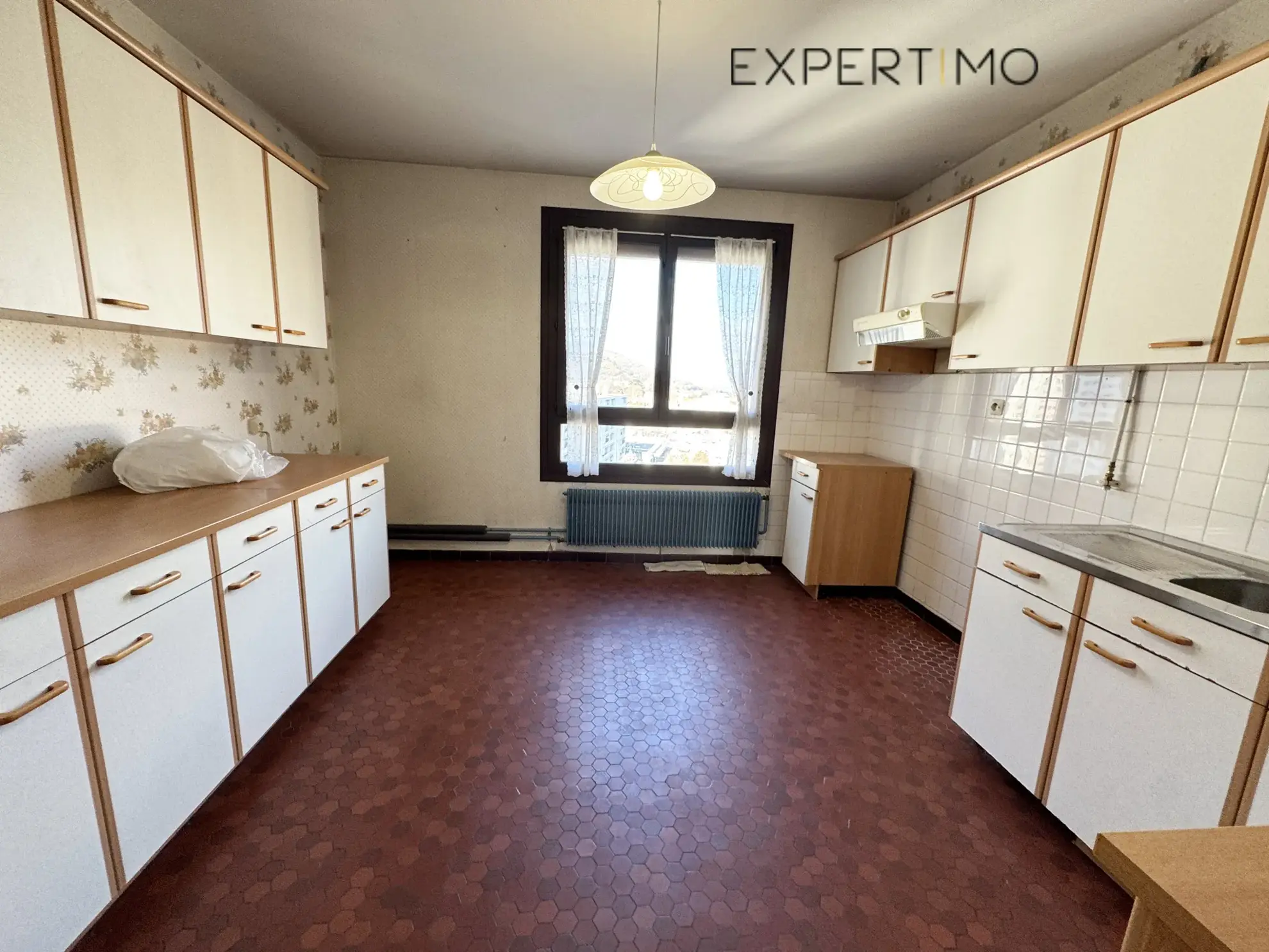 Appartement T4 de 97 m² avec balcon à Sassenage, résidence sécurisée 