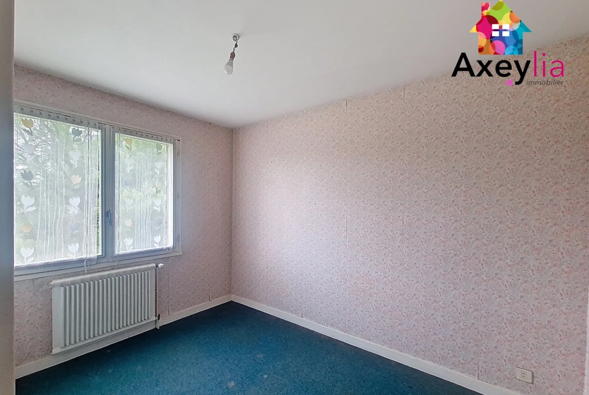 Maison familiale à vendre près de La Clayette avec garage et terrain arboré 