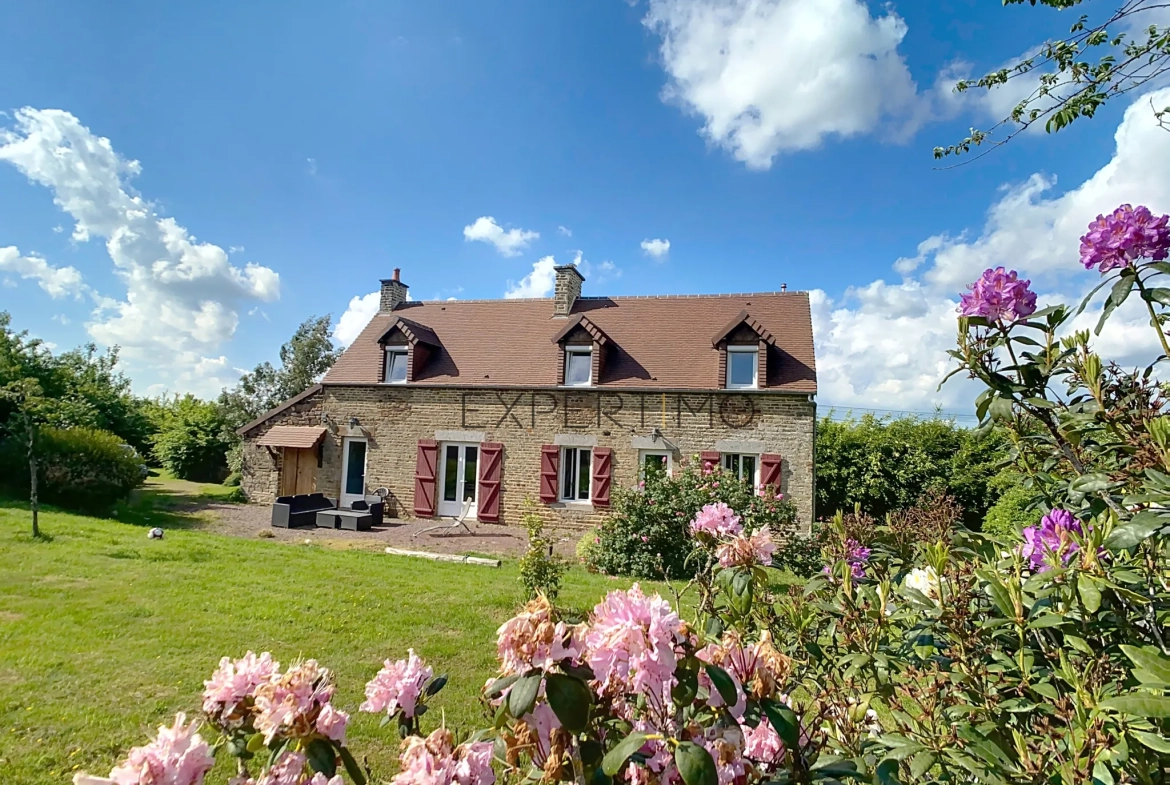 Maison en pierre de 130 m² avec dépendance et terrain constructible, proche Aunay-sur-Odon 