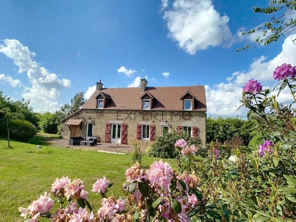 Maison en pierre de 130 m² avec dépendance et terrain constructible, proche Aunay-sur-Odon
