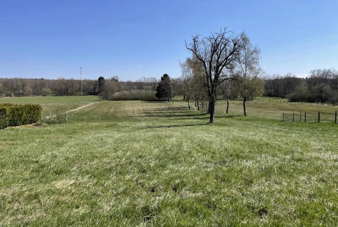 Terrain constructible à Fontaine, vue dégagée, environ 13 ares à bâtir 